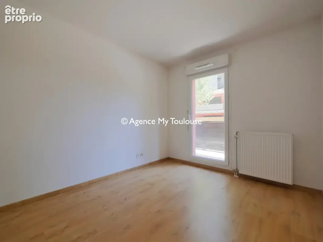 Montaudran, T3 de 70 m2 en rez de chaussée avec grand balcon et 2 places de parking dans résidence récente - photo 8
