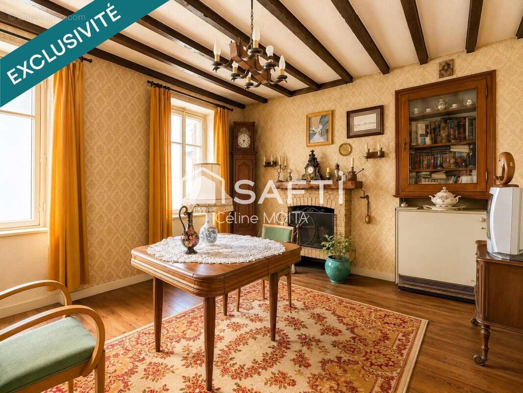 Maison 96 m² à Saint-Etienne-De-Saint-Geoirs  - photo 2