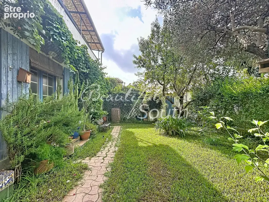 Élégance, volumes et jardin arboré au cœur de Perpignan - photo 2