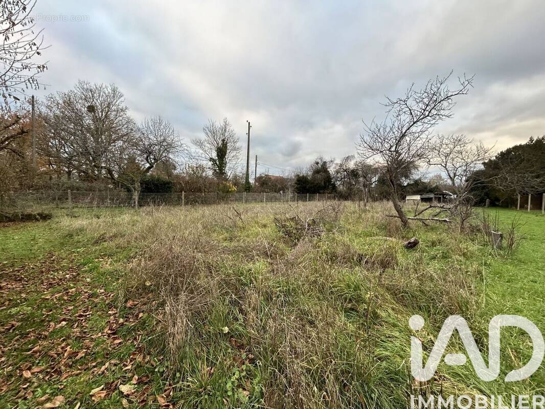 Photo 1 - Terrain à GUERNES