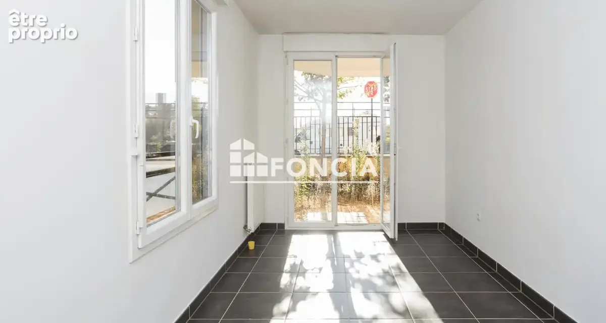 FRANCONVILLE- F2 en rez de jardin - photo 2