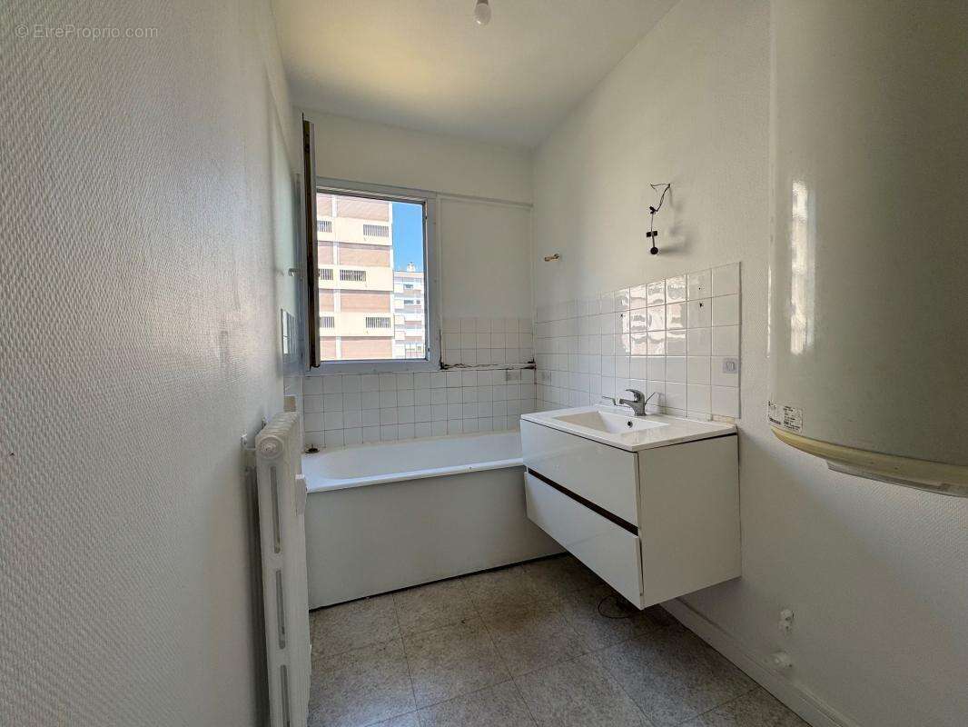 Appartement t4 au 1er étage avec ascenseur - photo 13