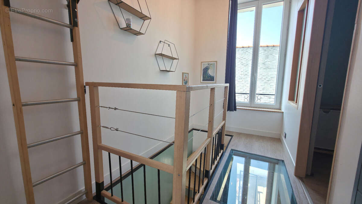 Charmante petite maison rénovée d'environ 50m² avec jardin et stationnement secteur Pont de Paille à Trignac - photo 9
