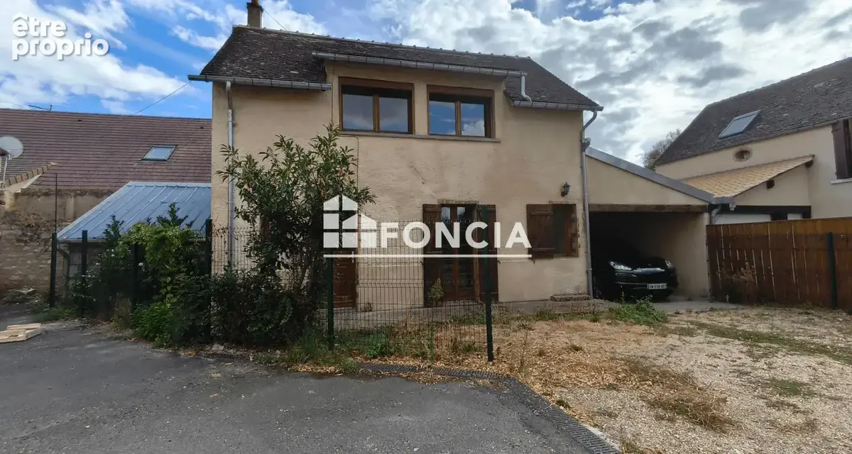 Immeuble de 2 appartements et une maison en centre ville de Dordives - photo 2