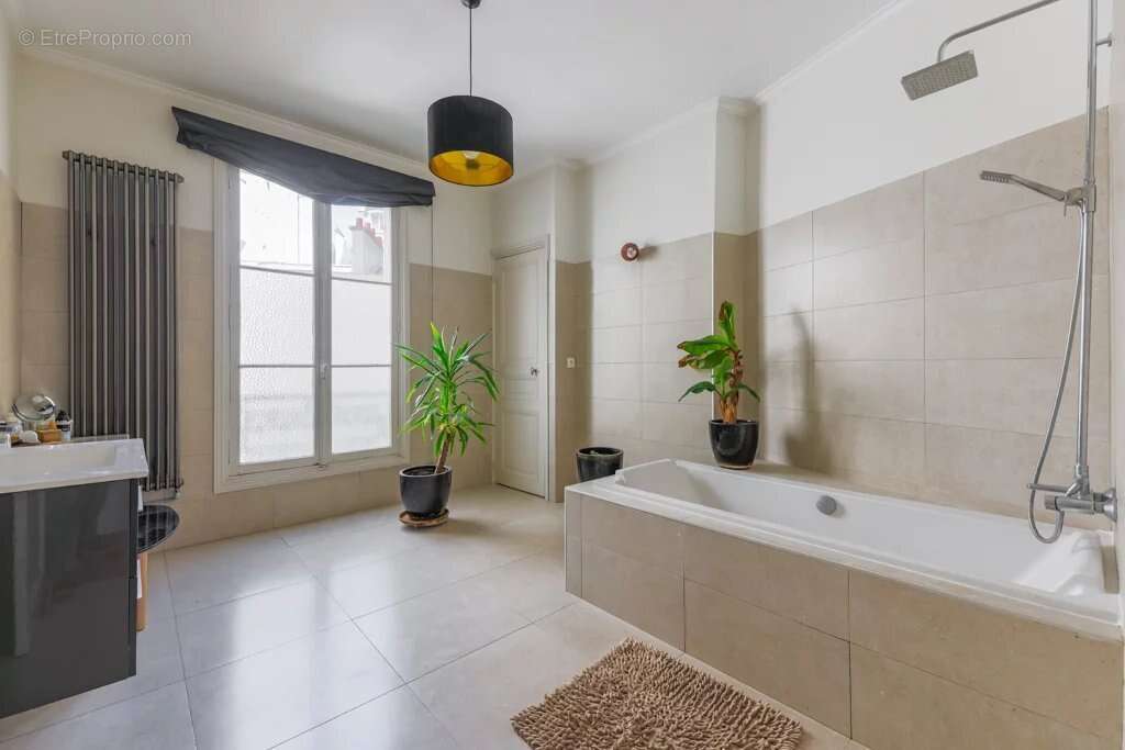 Appartement 4 pièce(s) 116 m2 - photo 8