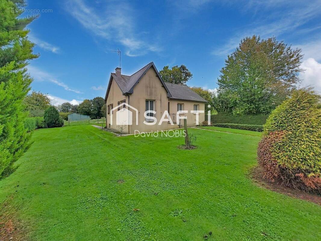 Photo 1 - Maison à SAINT-DENIS-DE-GASTINES