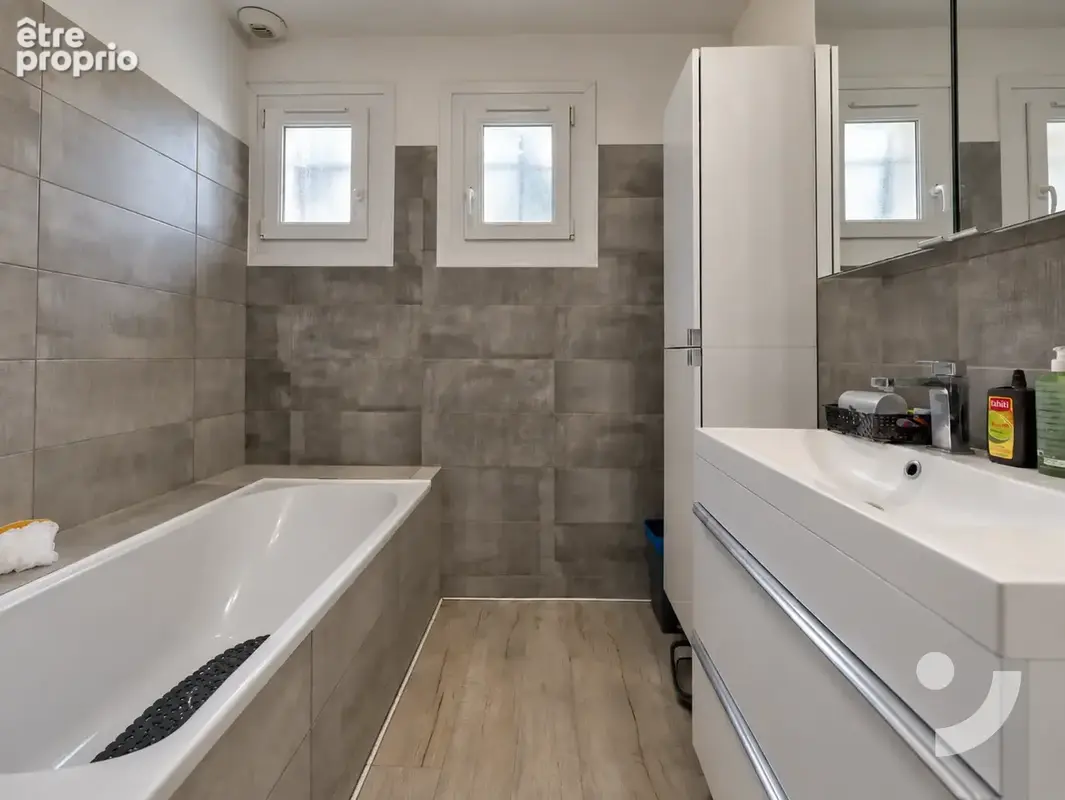 Maison familiale de 187 m2 avec grand terrain, confort de plain-pied et sous-sol complet à Aÿ - photo 11