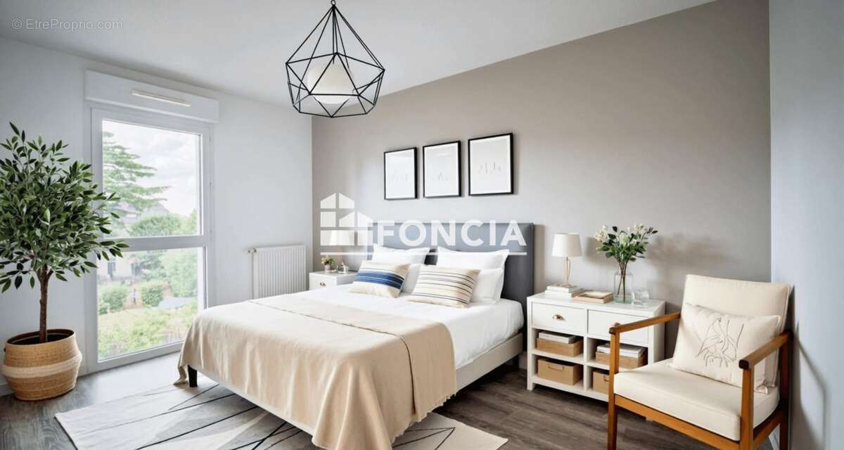 EXCLUSIVITE FONCIA quartier NANTES SUD / BOURDONNIERES : bel appartement T3 récent avec balcon, stationnement couvert, à proximi - photo 9