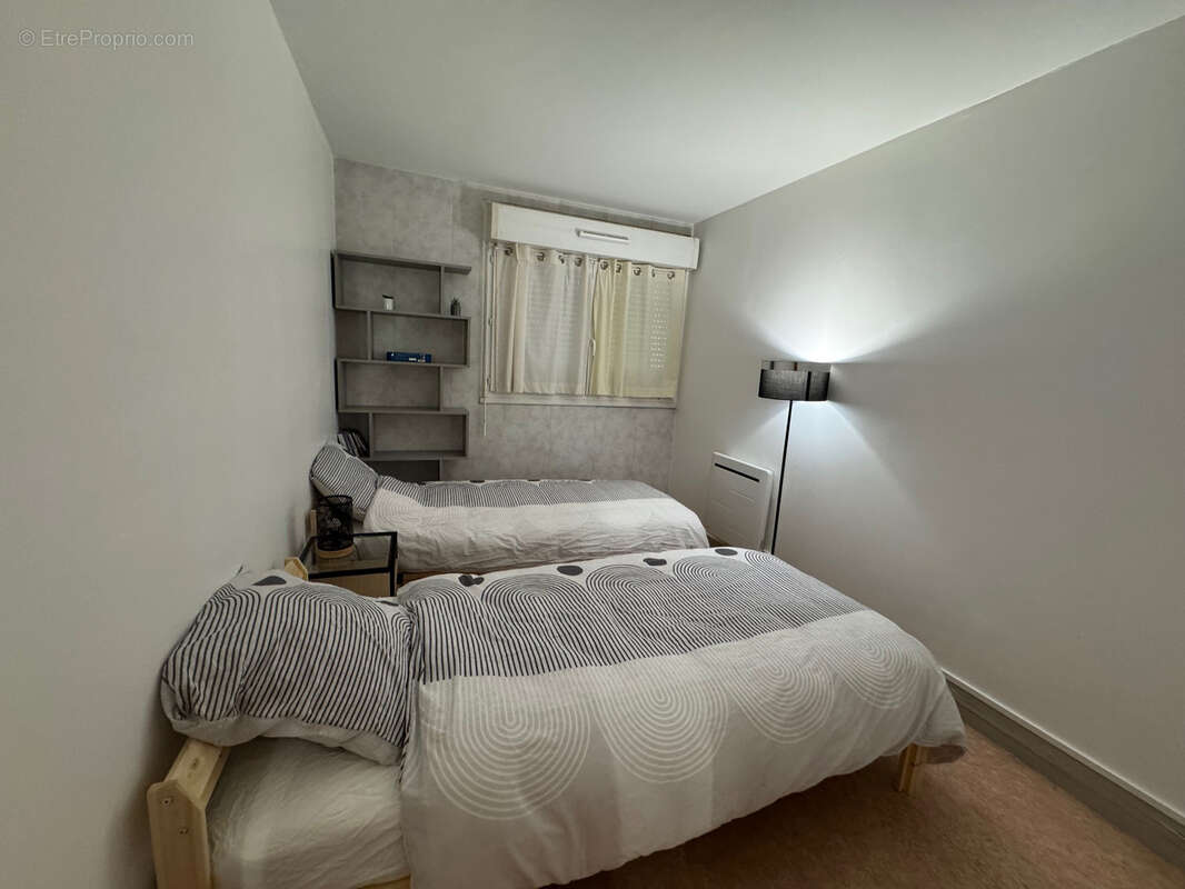 Appartement t3 - 61m2- avec cave et deux terrasses - photo 5