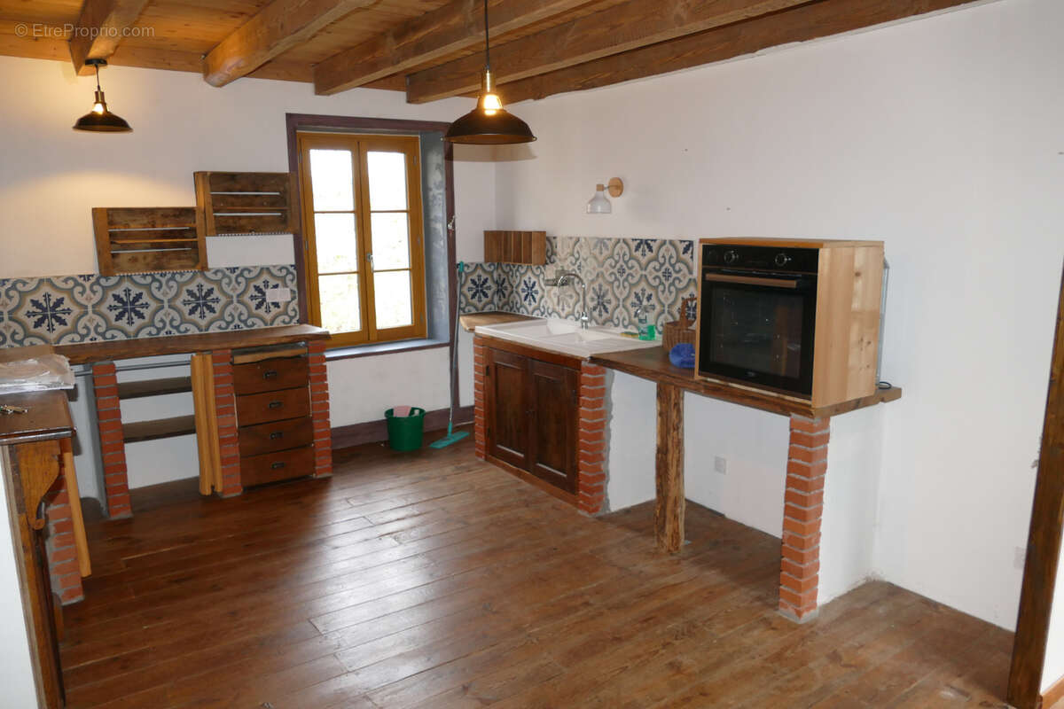 Grande maison rénovée avec atelier ou local commercial, terrasse panoramique et jardin (Mourjou - Puycapel, 15) - photo 23