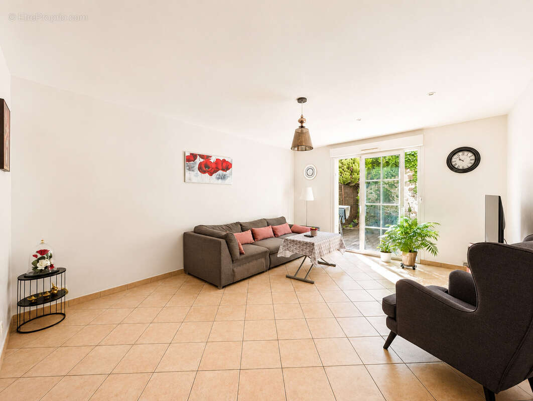 Maison 4 pièces de 100m2 avec 3 chambres et un jardin - photo 3