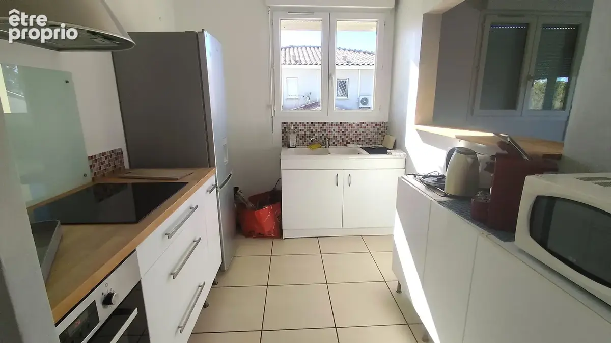 Marguerittes appartement 100m2 lumineux 4 chambres 2  parkings - photo 3