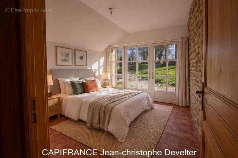 Maison à vendre proche de GORRON (53)maison en pierre 4 chambres sur terrain 1,37 hectare avec garage - photo 6