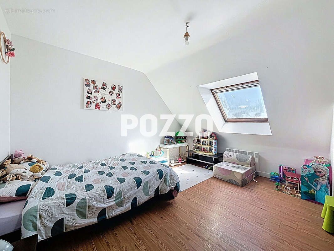 Maison à JUVIGNY-LE-TERTRE