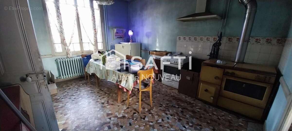 Photo 3 - Maison à SAINT-CLEMENT-DE-REGNAT