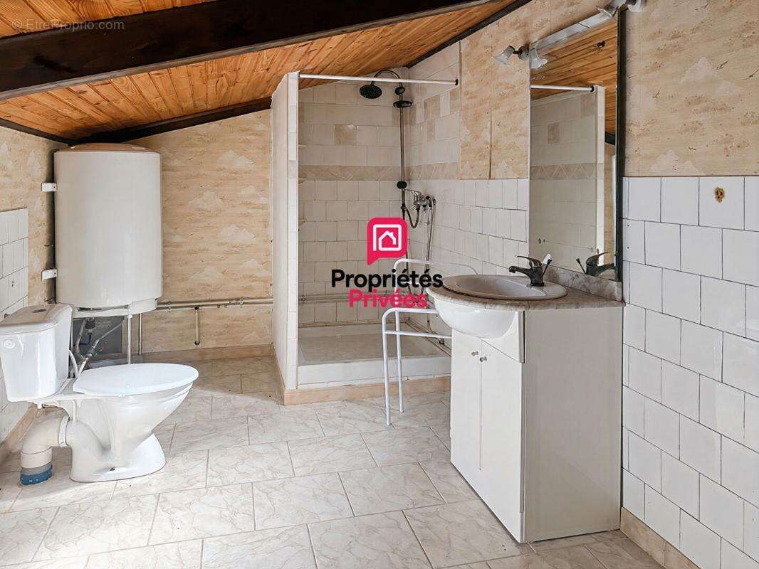 Maison 185m² - 3 chambres - jardin et grange attenante - photo 9