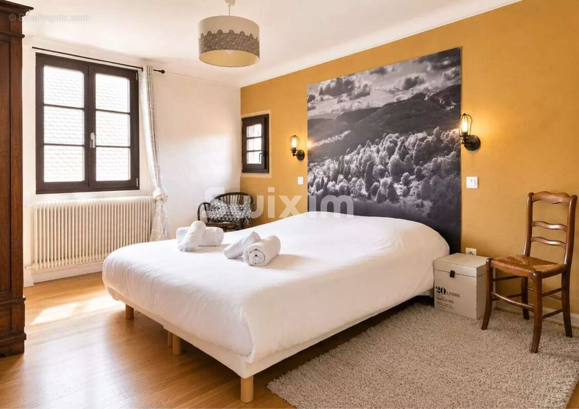 Appartement 4 pièces, trois chambres, combles et stationnement couvert - photo 4