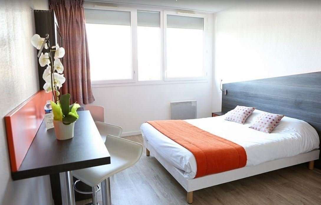 INVESTISSEMENT LOCATIF  CHEVILLY-LARUE  Résidence d'Affaires Adonis Paris Sud *** - 7,37% de rentabilité - photo 2