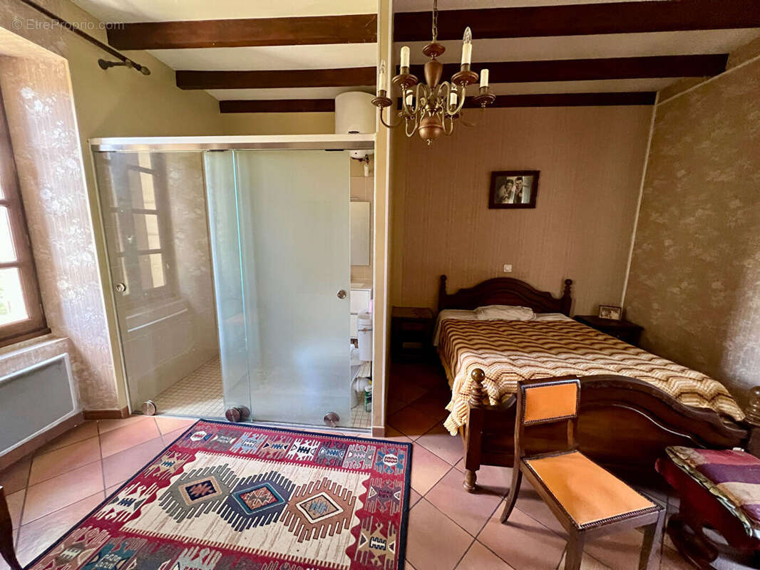 Maison en pierre à deux pas de Villeréal - photo 4