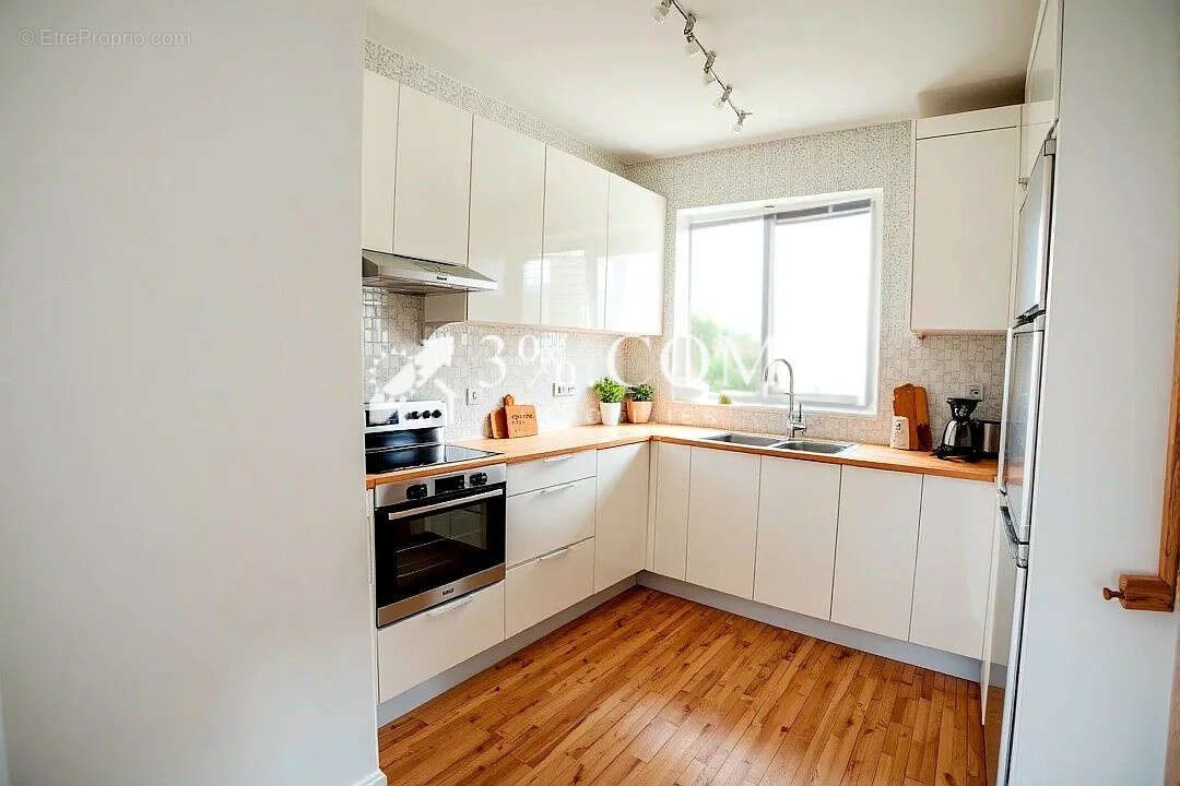 Appartement T4 à Bois-Blancs - 3 chambres - Balcon - Cave - - photo 8