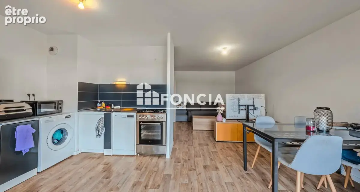 Appartement t3 avec place de parking en s/sol - photo 1