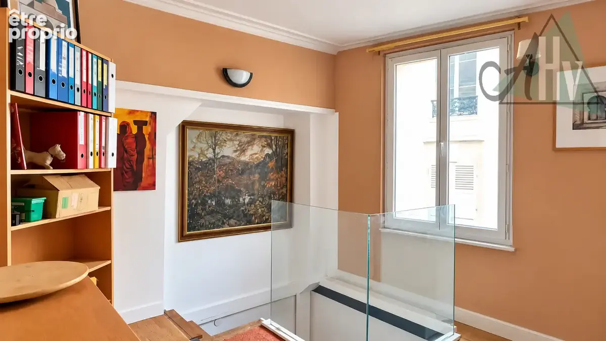 Immeuble à usage mixte - un commerce et un appartement en duplex - photo 3