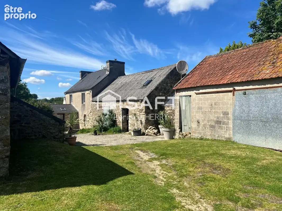 Photo 1 - Maison à LANNEUFFRET