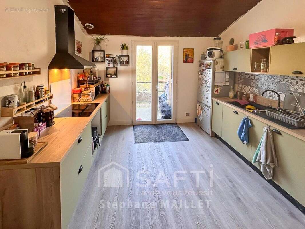 Maison 75 m² à Villeneuve-De-Marsan  - photo 2