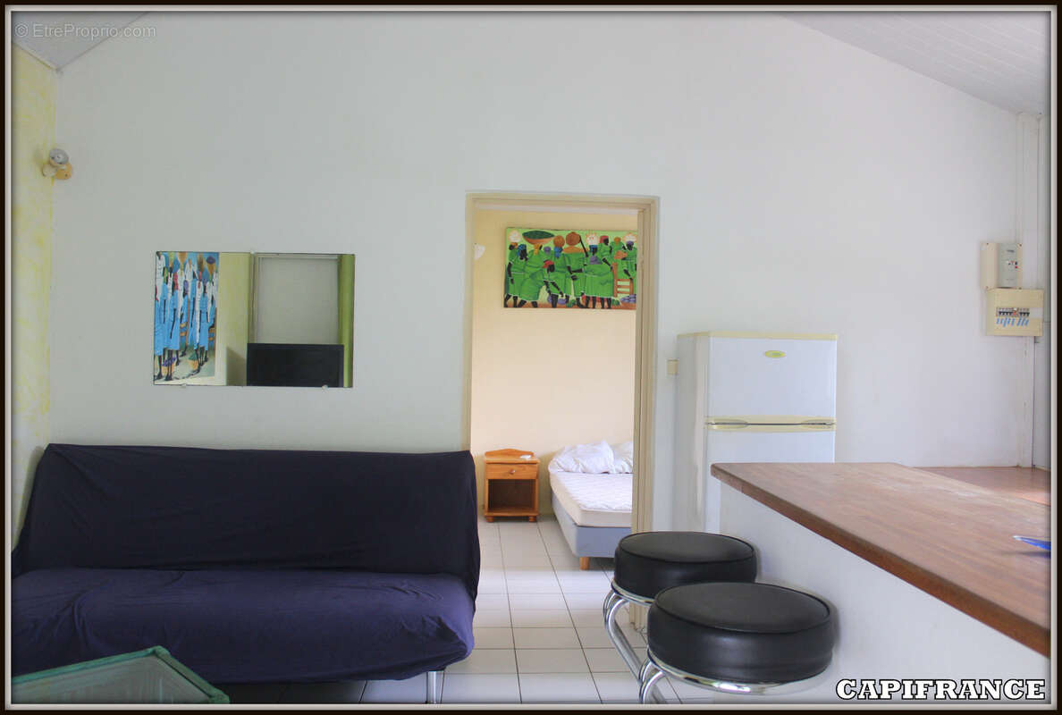 A vendre a kourou (97310) une magnifique maison en bois t5 de 106 m² avec 2 maisons t2 independantes - terrain de 775 m² - au pr - photo 22