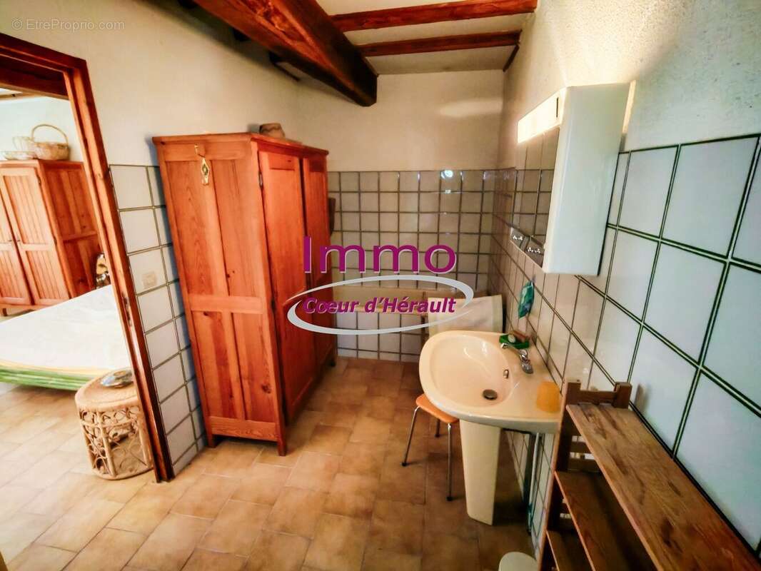 SAINT-PRIVAT : maison de village en pierres avec cave et terrasse - photo 6