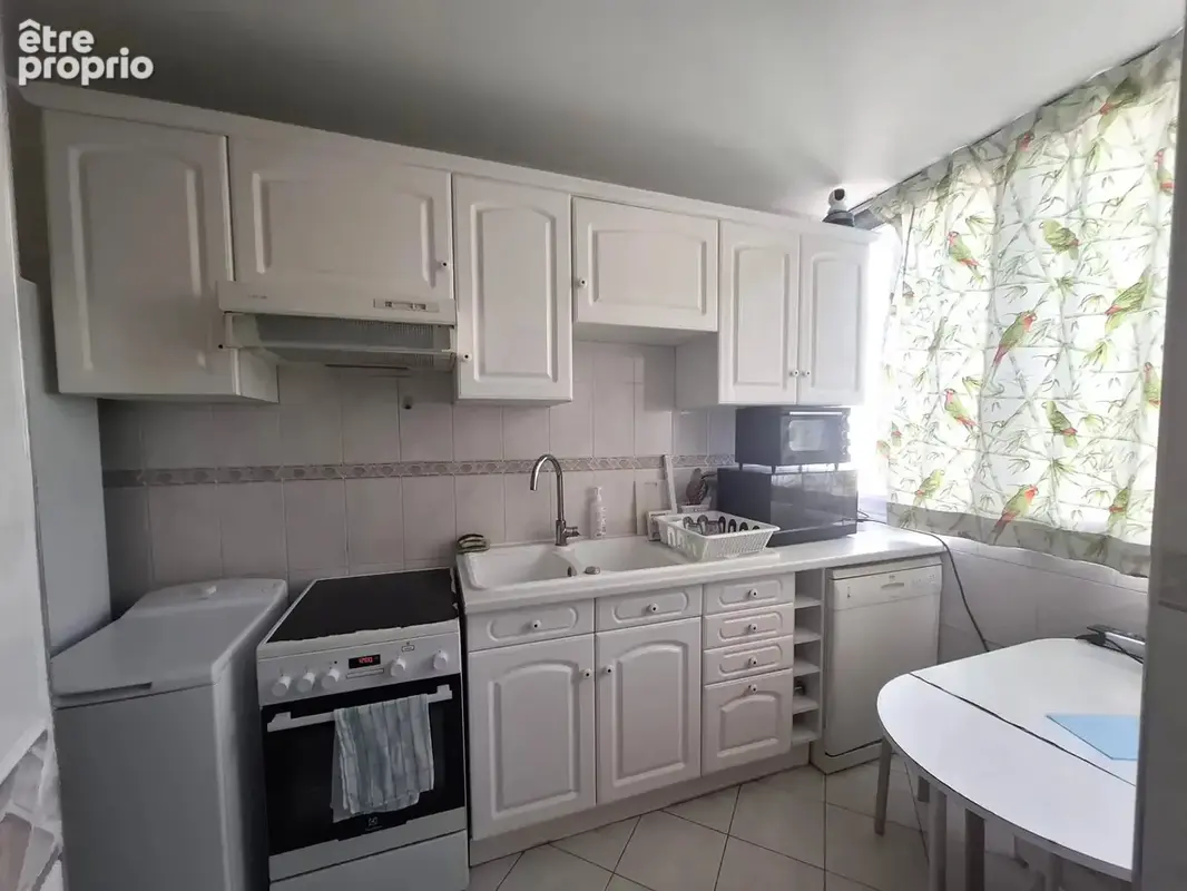 75013 appartement 3/4 pieces 63.48 m² avec une cave et un parking - photo 2