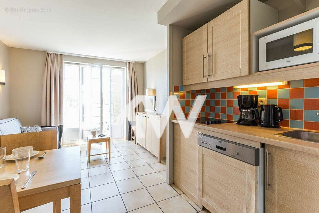 Maison 31 m² à Port-En-Bessin-Huppain  - photo 7