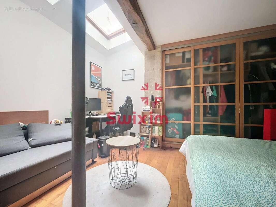 3472849_896983_photo_7.jpg - Appartement à PARIS-11E