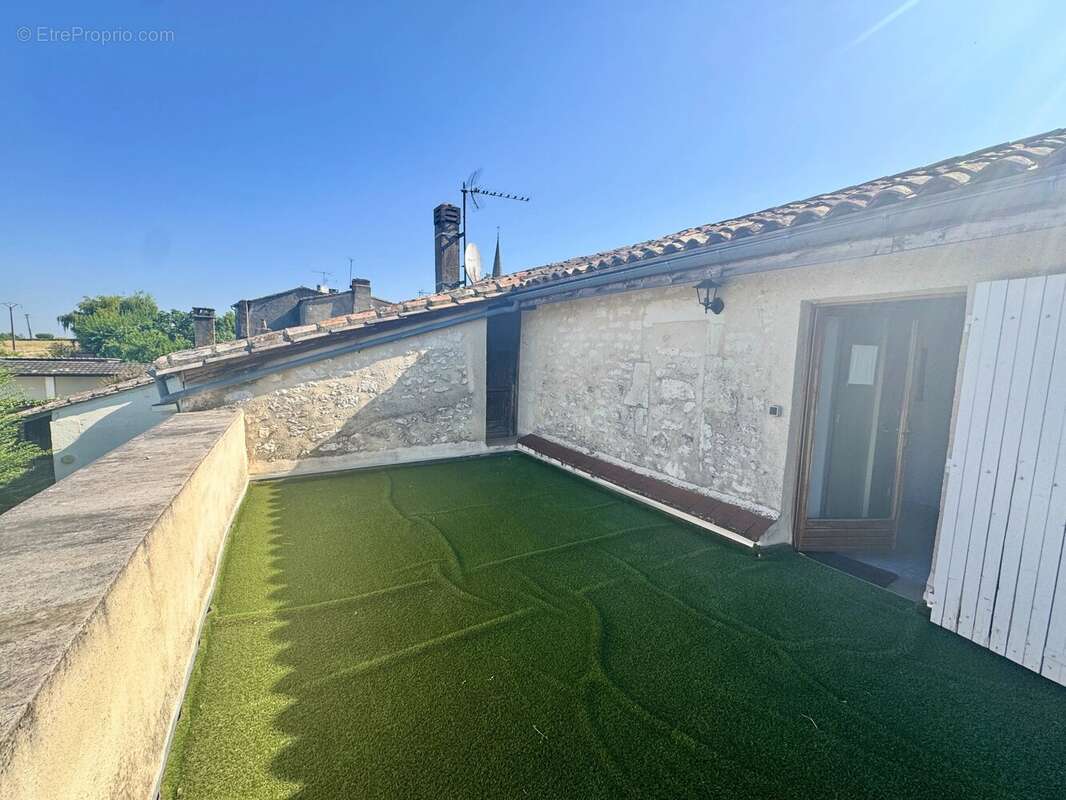 Une maison de charme dans un village très prisé - photo 12
