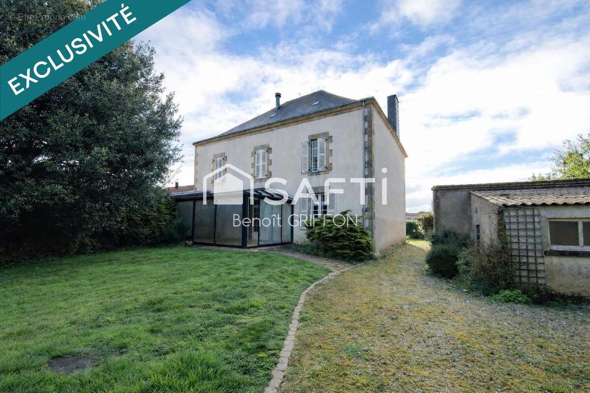 Photo 2 - Maison à LES LANDES-GENUSSON