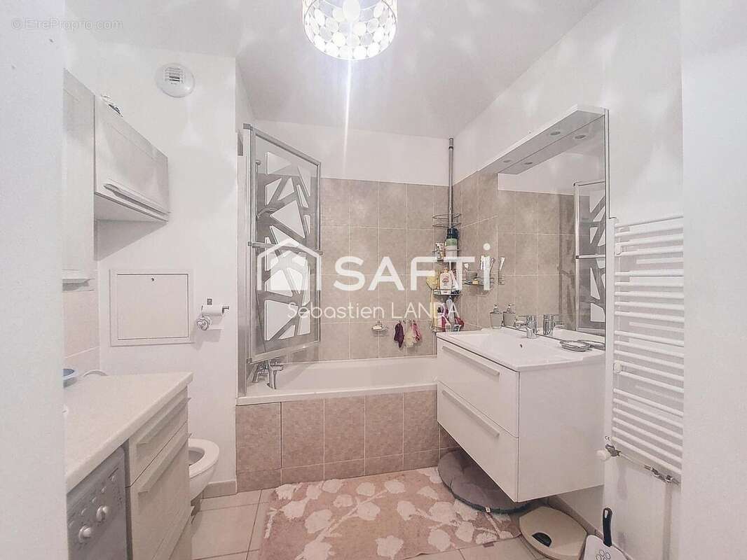 Photo 7 - Appartement à LE MESNIL-SAINT-DENIS