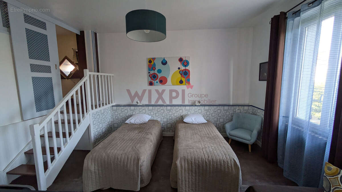 Maison à ROMANS-SUR-ISERE