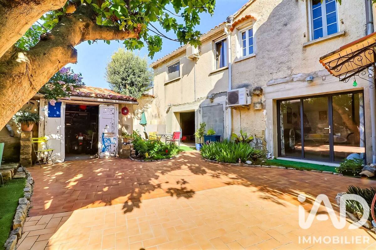Photo 1 - Maison à AIMARGUES