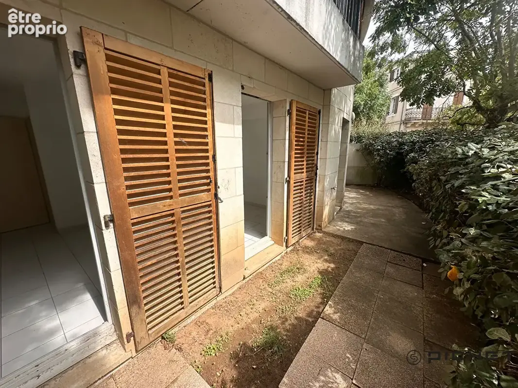 Appartement avec jardin en centre ville - photo 1
