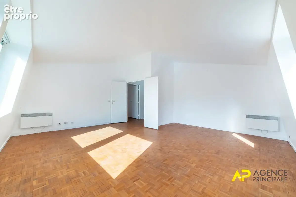 Exclusivité à La Garenne-Colombes : Superbe appartement 5 pièces au dernier étage avec parking et cave - photo 2