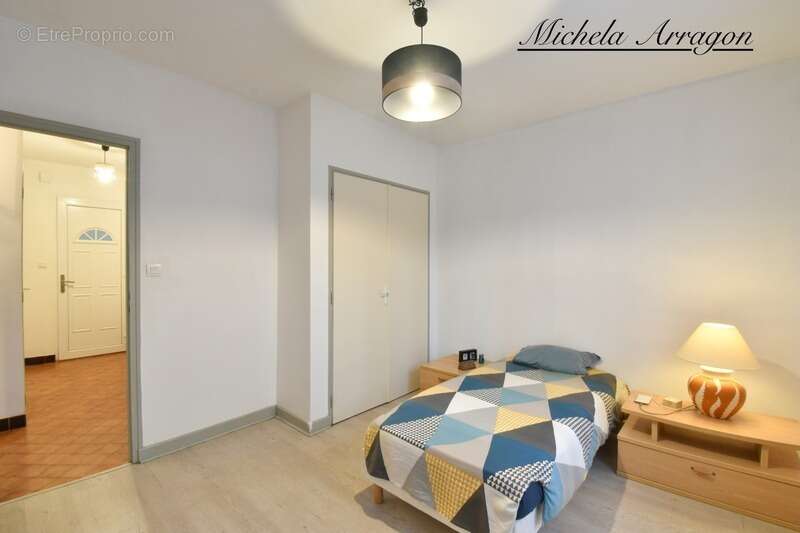 Villeneuve-sur-Lot – Appartement T3 plain-pied 82 m² avec grand jardin - photo 7