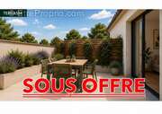 Appartement à FRONTONAS