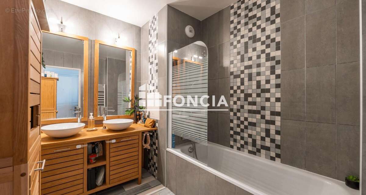 Appartement coup de cœur – Dernier étage avec exceptionnelle terrasse de 45 m² ! - photo 11