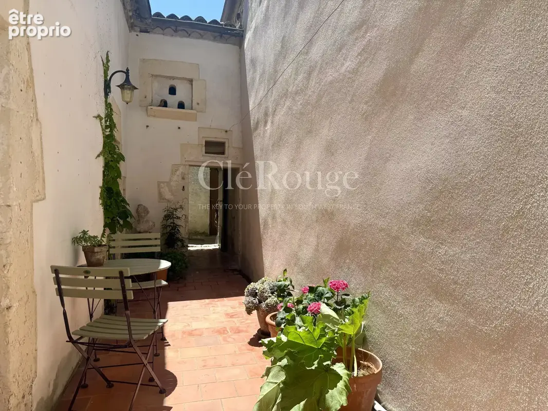 Au cœur d’Eymet – Maison de caractère avec grange et cour plein sud - photo 13