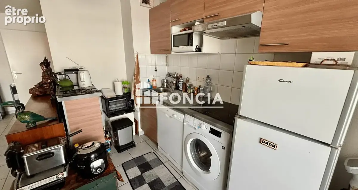 Dans résidence avec gardienne, beau 3 pièces de 61 m2 + balcon, parking en sous-sol, actuellement loué - photo 4