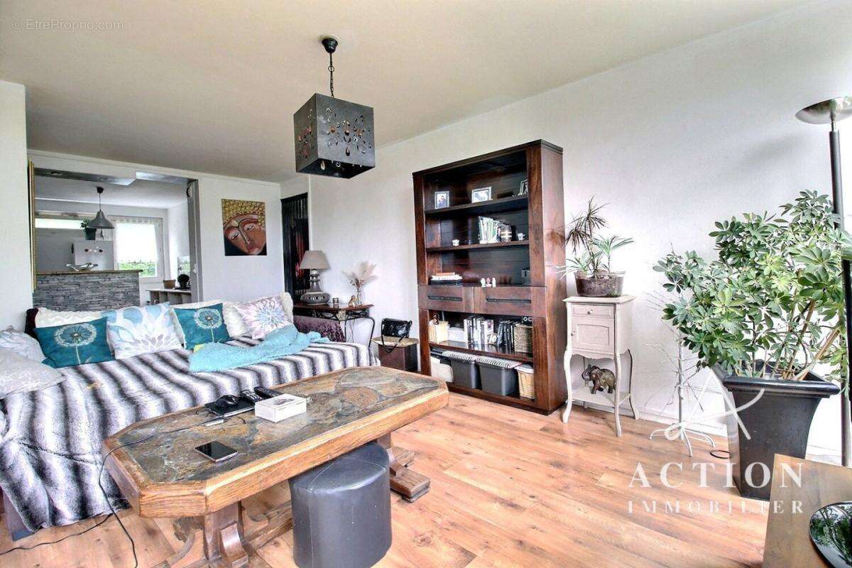 Appartement t3 - 69 m² - 2 chambres - cave - photo 6