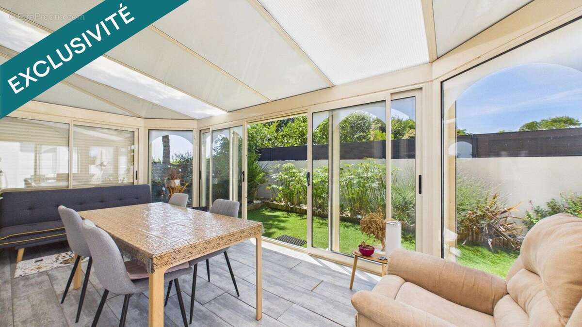 Maison 85 m² à Saint-Xandre  - photo 2