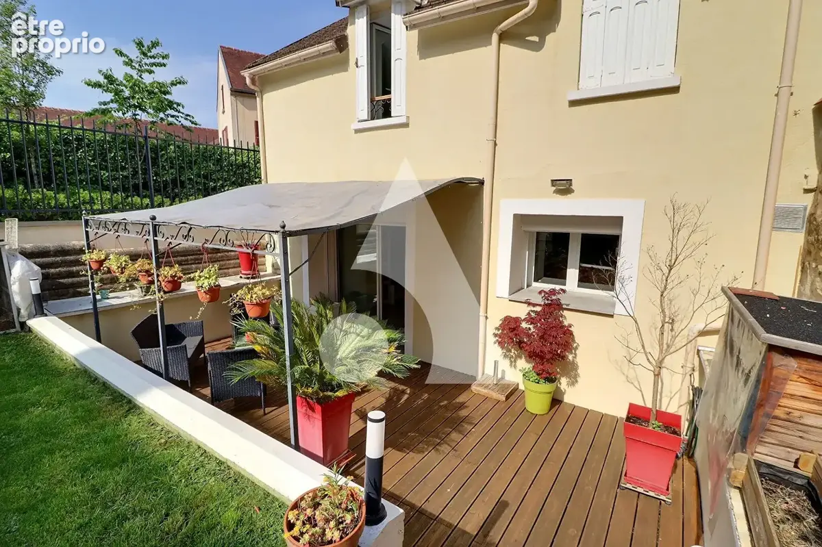 Maison de ville avec jardin et parking en plein centre-ville - photo 11