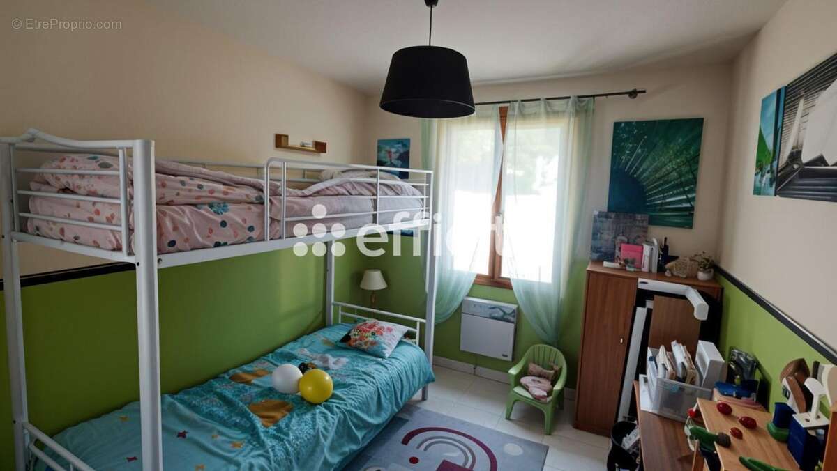 Maison 100 m² à Aytre  - photo 11