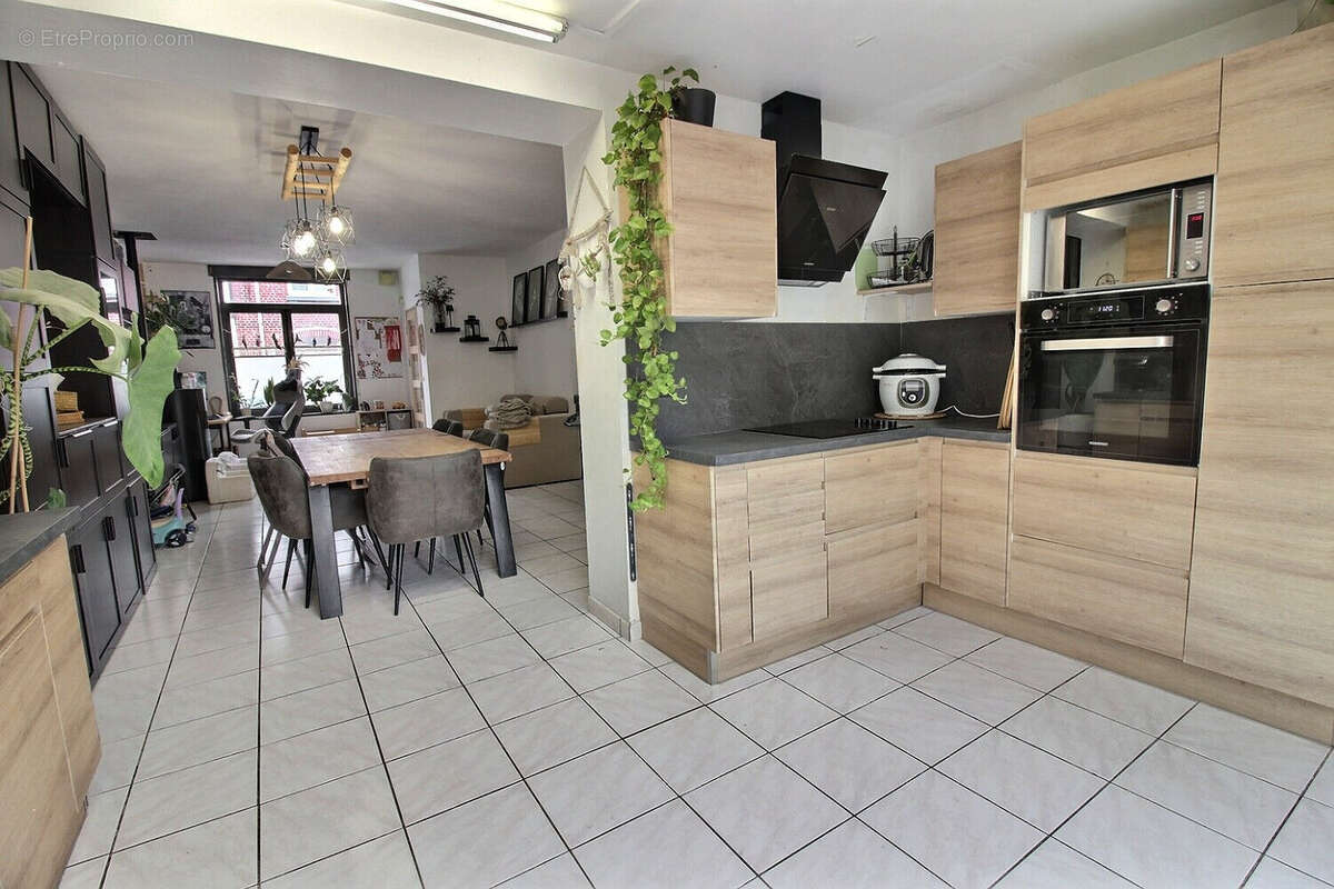 Maison LOMME - trois chambres - extérieur - cave et grenier - photo 5